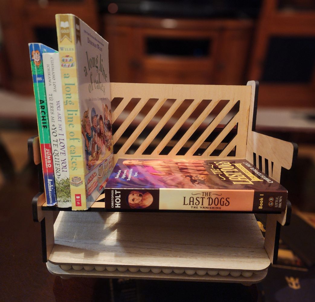 Wooden book bench to hold books or other small items.