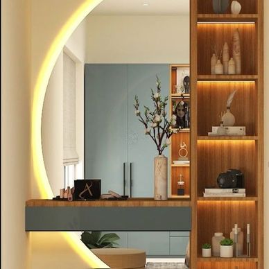 Modern vanity area with illuminated circular mirror and wooden shelving.