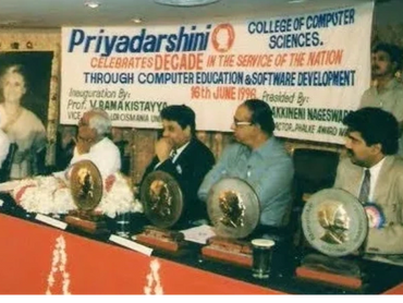 Officials at Priyadarshini College of Computer Sciences celebrating a decade of service.