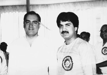 Two men posing for a black-and-white photograph at a formal event.