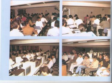Four vintage photos of students attending computer classes in a classroom with old monitors.