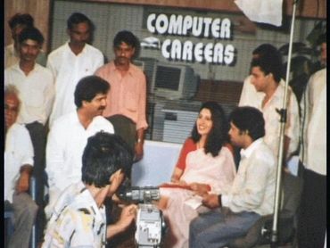 Group discussing computer careers in a casual meeting setting.