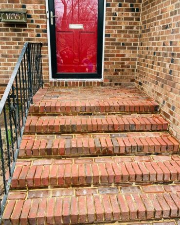 Worn brick front steps at a red door, Richmond VA – before