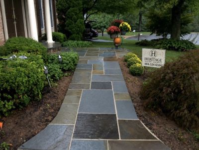 Flagstone front walkway installed by Heritage Masonry & Brick