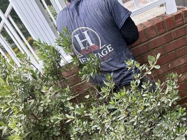 Heritage mason repairing a brick step cheek wall, Richmond VA