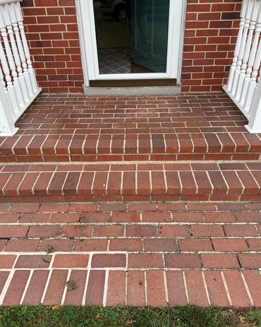 Worn brick steps with eroded mortar joints, Richmond VA – before