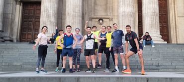 Swifty Mondays runners on steps of St. Pauls, London mid 5k free run, meeting new people