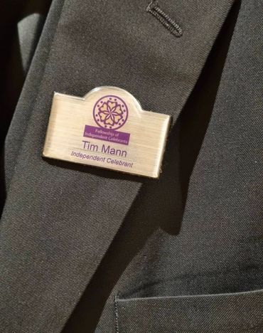 Tim's suit, displaying his Celebrancy name badge