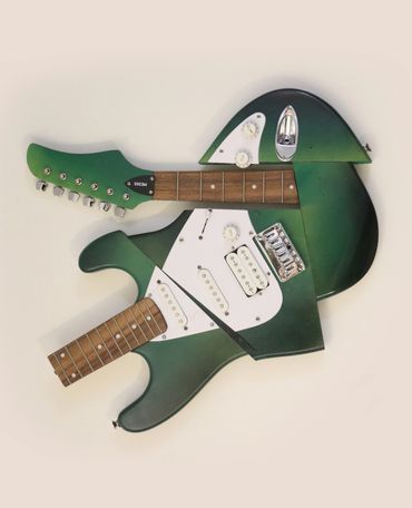 Green Electric guitar sculpture as reimagined by artist dixon bergman