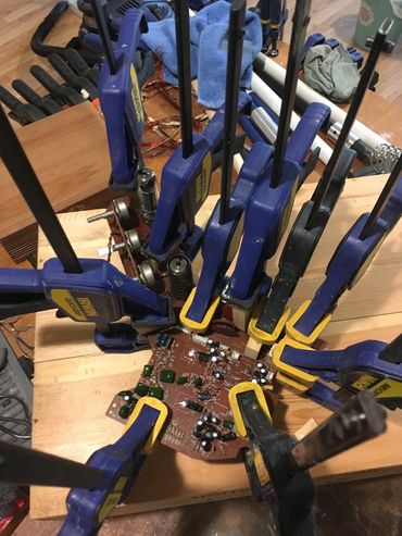 Assembly process of gluing up the guitar pick guard assemblage