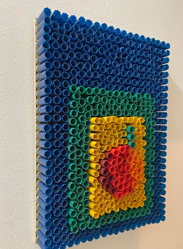 Contemporary art made with sportsman's spent shotgun shells is reminiscent of Joseph Albers painting