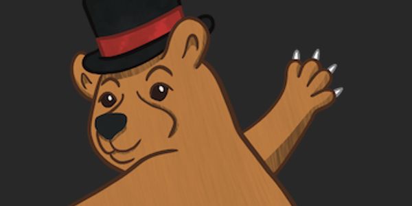 Brown bear in a black and red top hat