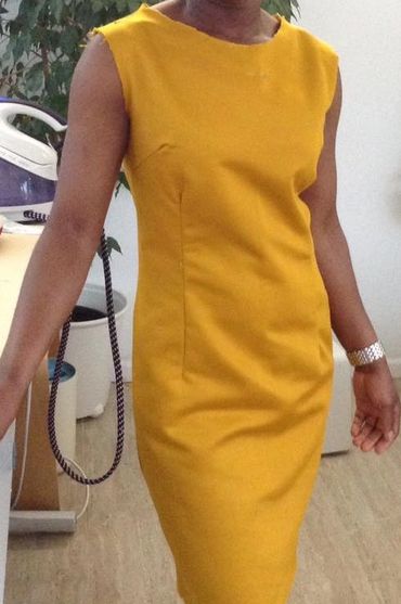 A yellow shift dress.
