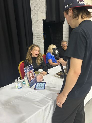 Client Olivia Youngers answering questions for a podcast interview during Destination in Blackpool