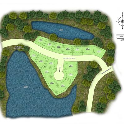 Map showing residential lots near two ponds surrounded by trees.