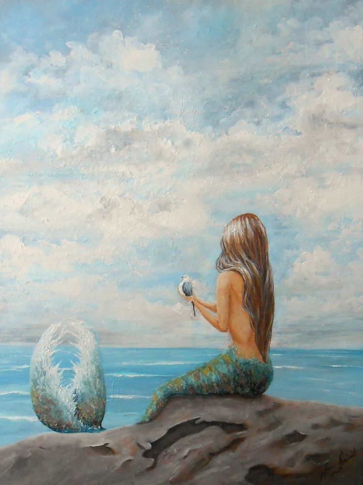 Mermaid sitting on rock painting
