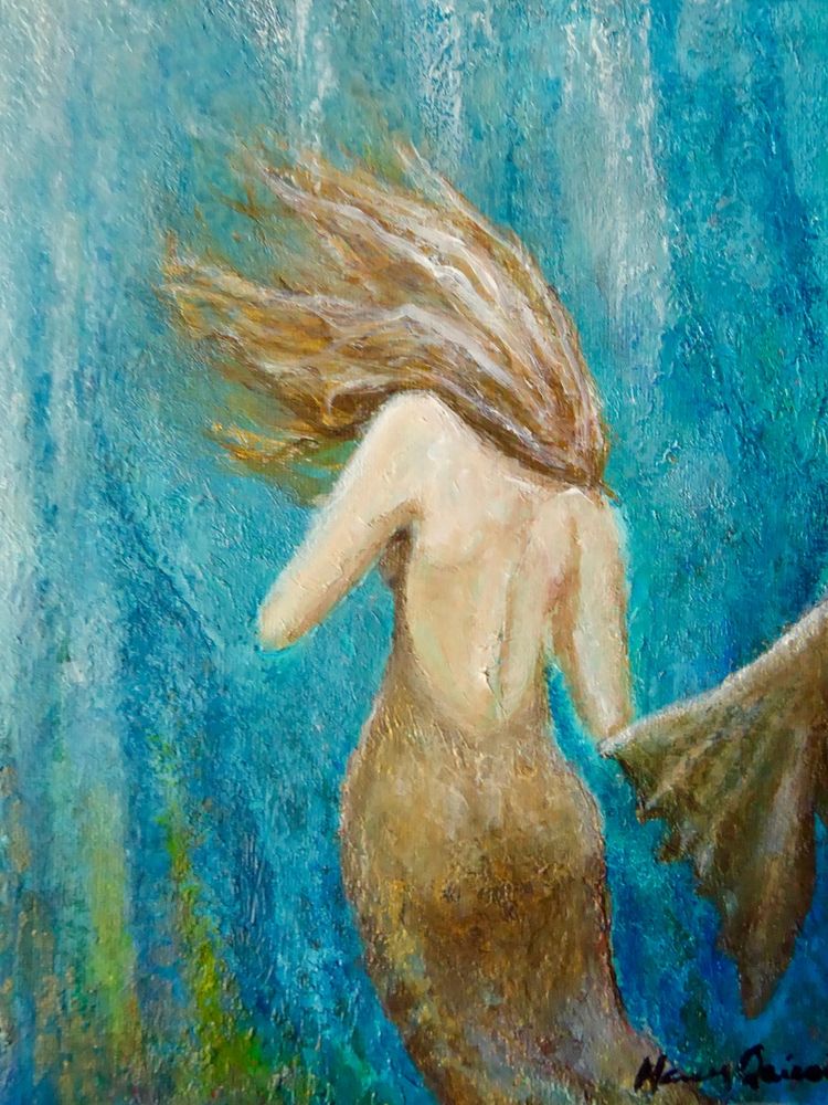 Artistic mermaid under the sea painting.
