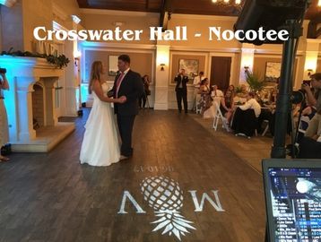 Wedding couple dancing at Crosswater Hall Nocatee, Florida  Gobo monigram on the floor