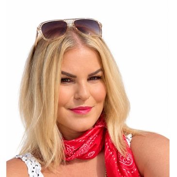 Blonde woman wearing sunglasses on her head and a red scarf.