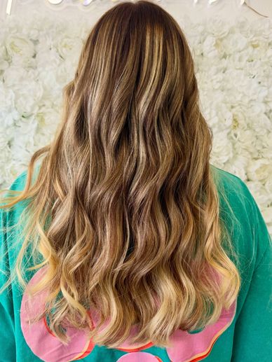 Full balayage with seamless blonde blend and haircut in Fort Lauderdale