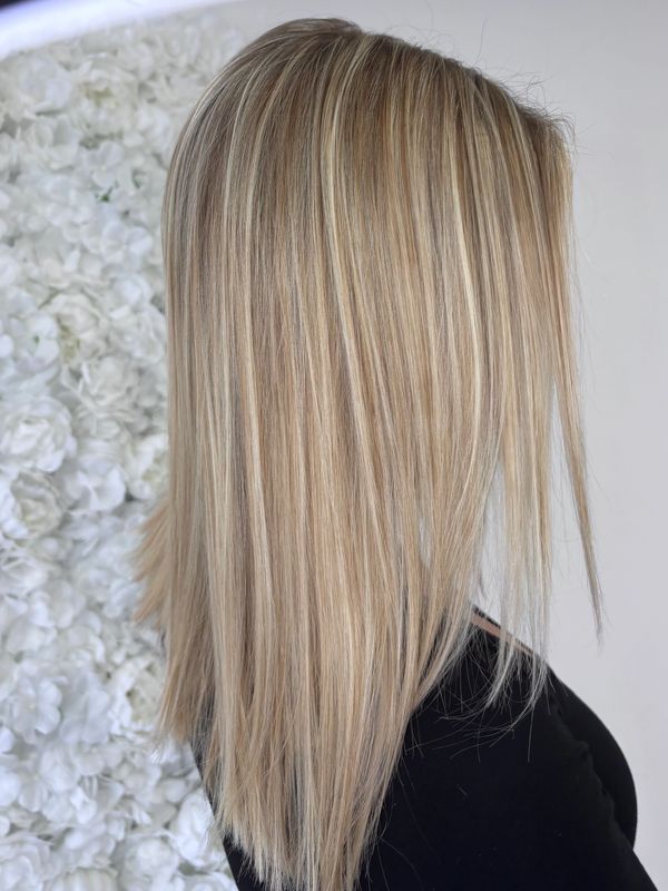 Blonde highlights and dimensional color by Krystal Lauren Serbeck at Platinum 954 Hair Salon