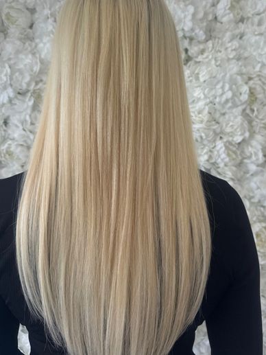 Soft platinum blonde hair transformation with K-tip extensions