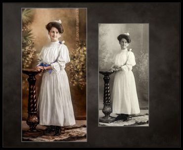 A turn of the century young woman posing in a long white dress for her graduation photo.