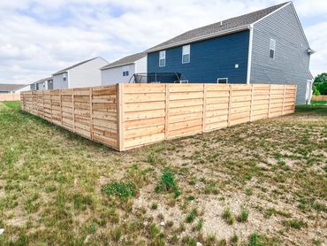 Horizontal Cedar Board on Board Fence Installation Service in Heritage Lake, IN