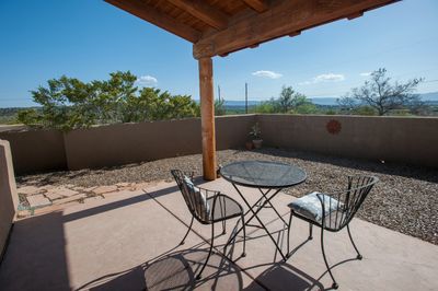 Private courtyard and covered porch w/ table & chairs.  Sit, enjoy a cup of tea or watch sunset.