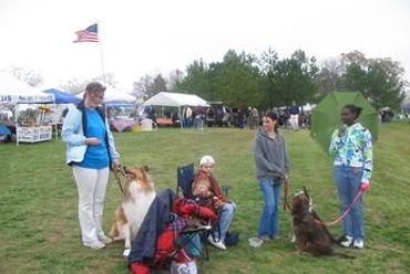 family along with their dogs