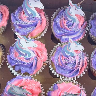 Colorful swirl frosted cupcakes