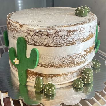 Naked cake with cactus decorations
