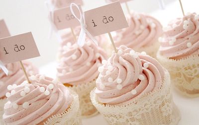 Pink wedding cupcakes with flags