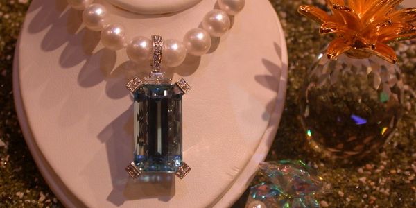 Aquamarine enhancer on Pearl Necklace
