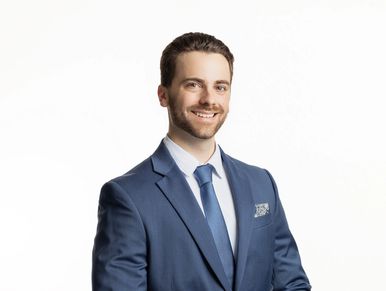 Professional headshot of a man