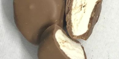 marshmallow covered in milk chocolate