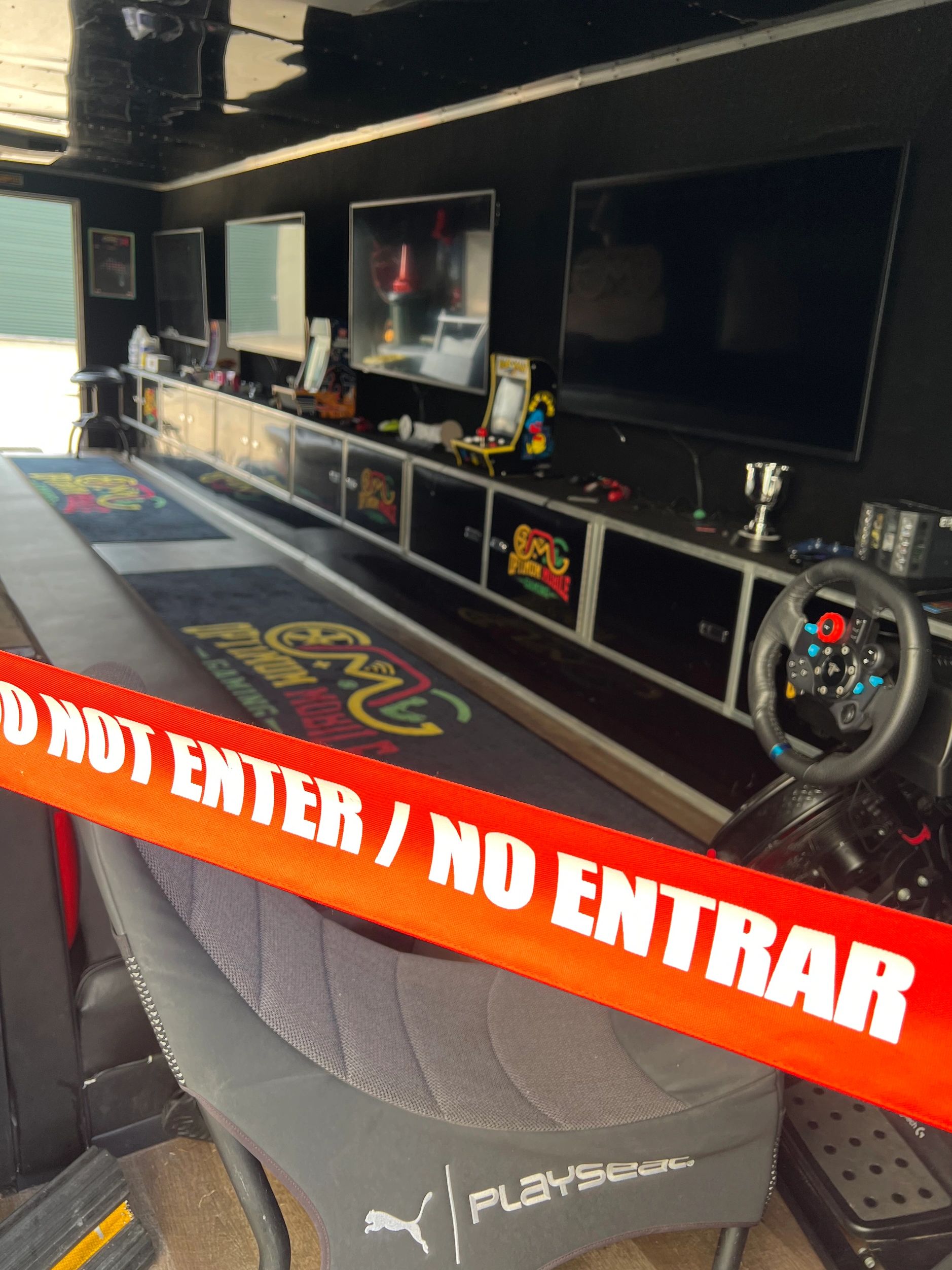 A mobile video gaming theater, designed for a compact and immersive gaming experience