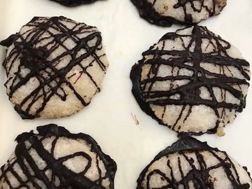 Coconut Macaroons drizzled dark chocolate.