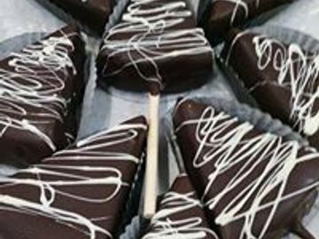 Cheesecake Wedges dipped in Dark Belgian Chocolate