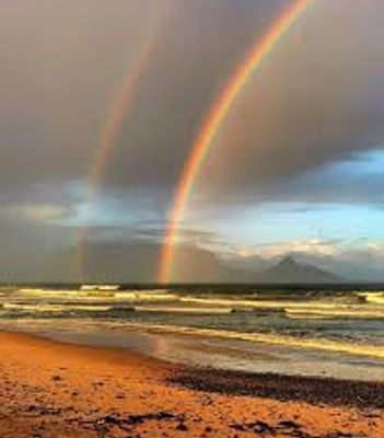The rainbow is an image of hope for grievers. This picture is take of Table Mountain in Cape Town