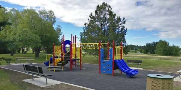 Playground equipment, PIP pour in place rubber surfacing, site furnishings, concrete work, 