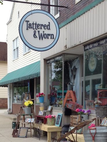 Tattered & Worn storefront handmade sign from MDO