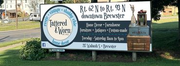 Tattered & Worn billboard sign design