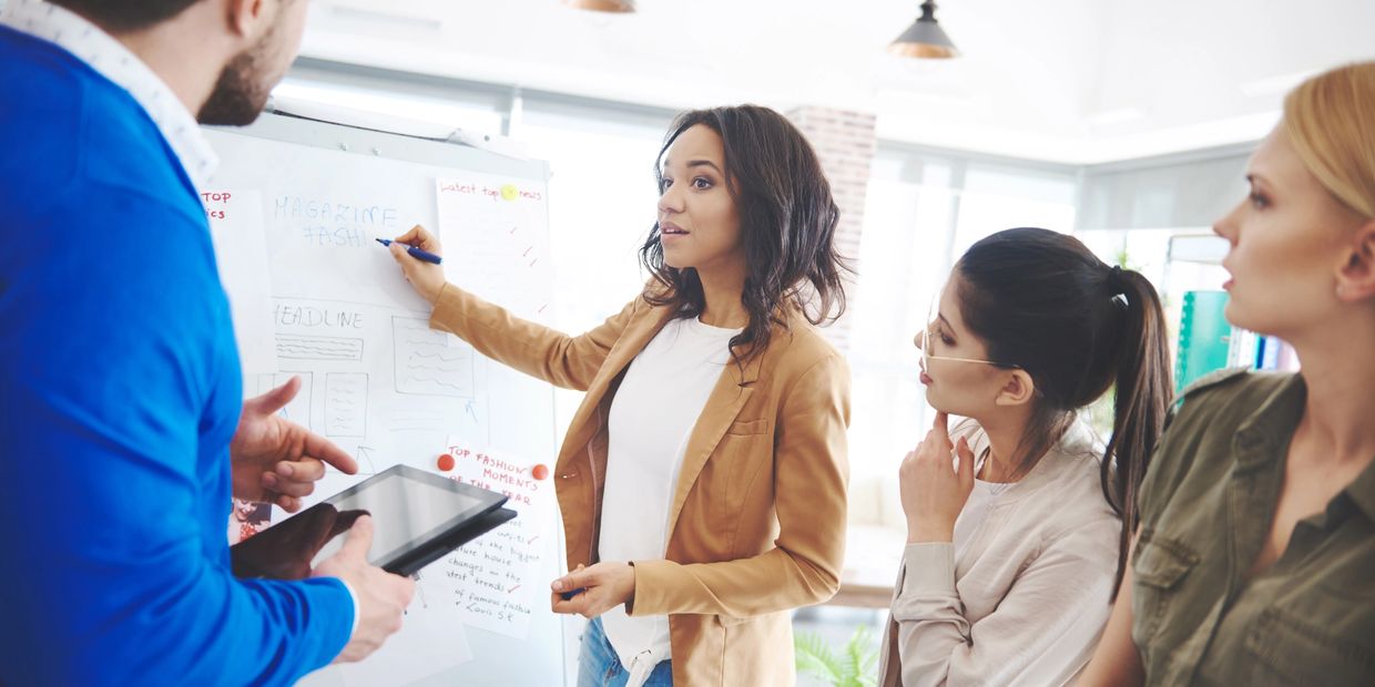 Group of businesspeople brainstorming.
