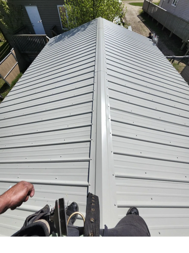 View from a person working on a newly installed metal roof.