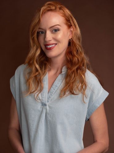 Portrait in 3/4 length profile. Red and blue on brown background.