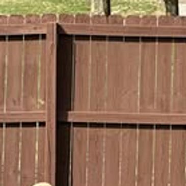 Wood privacy fence stained by Ronald Willis of Willis Outdoors LLC