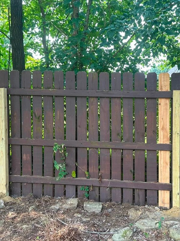 Wood privacy fence repair in Newburgh, Indiana by Willis Outdoors LLC.