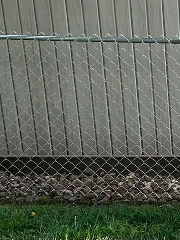 Chain link fence addition in Newburgh, Indiana by Willis Outdoors LLC