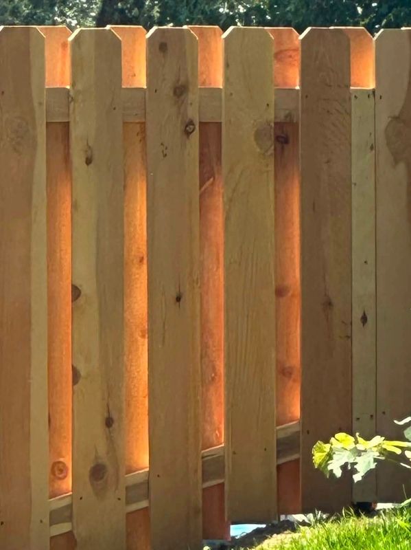 Shadowbox style cedar fence in Newburgh, Indiana by Willis Outdoors LLC